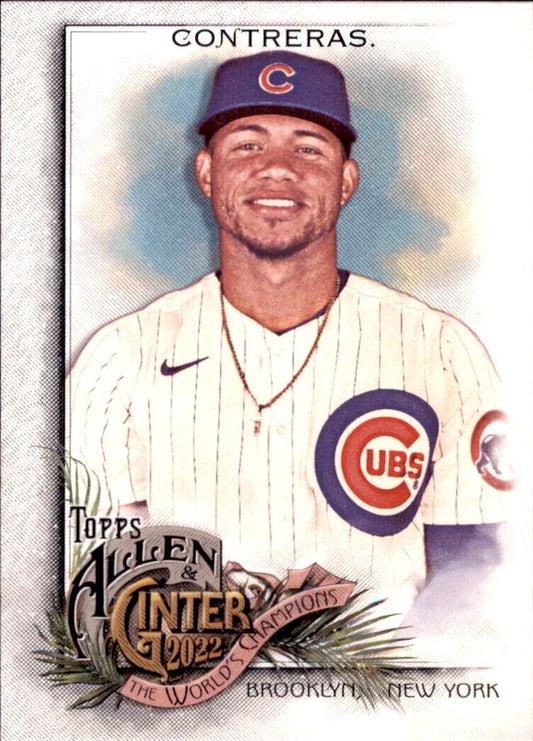 Baseball card of Willson Contreras Chicago Cubs in pinstriped uniform and blue cap