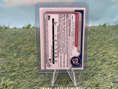 Yohandy Morales 2024 Bowman Chrome trading card in a protective case on display