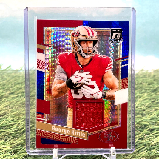 Red and holographic George Kittle Donruss Optic Threads Blue Hyper card with jersey piece