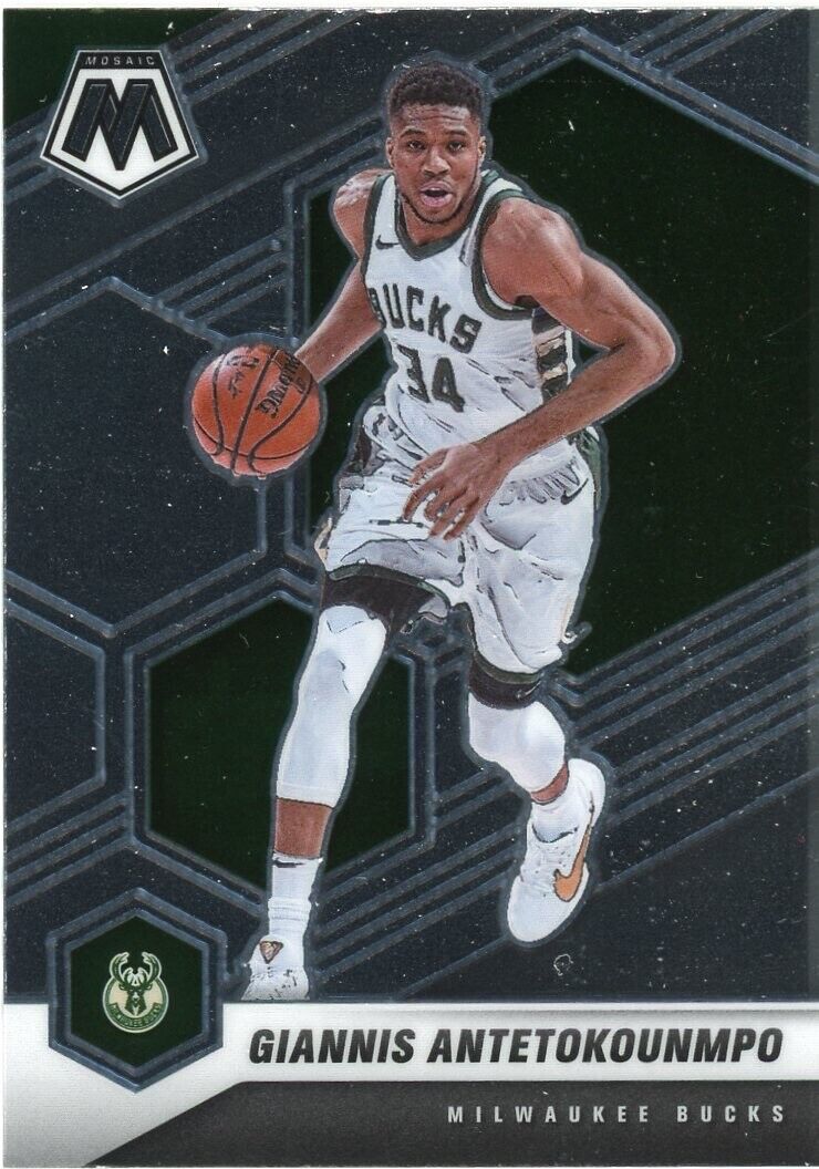 Basketball trading card of Giannis Antetokounmpo in white uniform dribbling ball