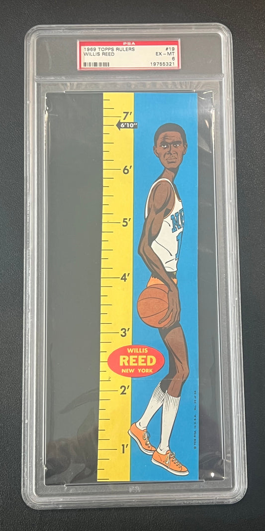 PSA-graded Willis Reed Topps Rulers vintage basketball player growth chart on blue background