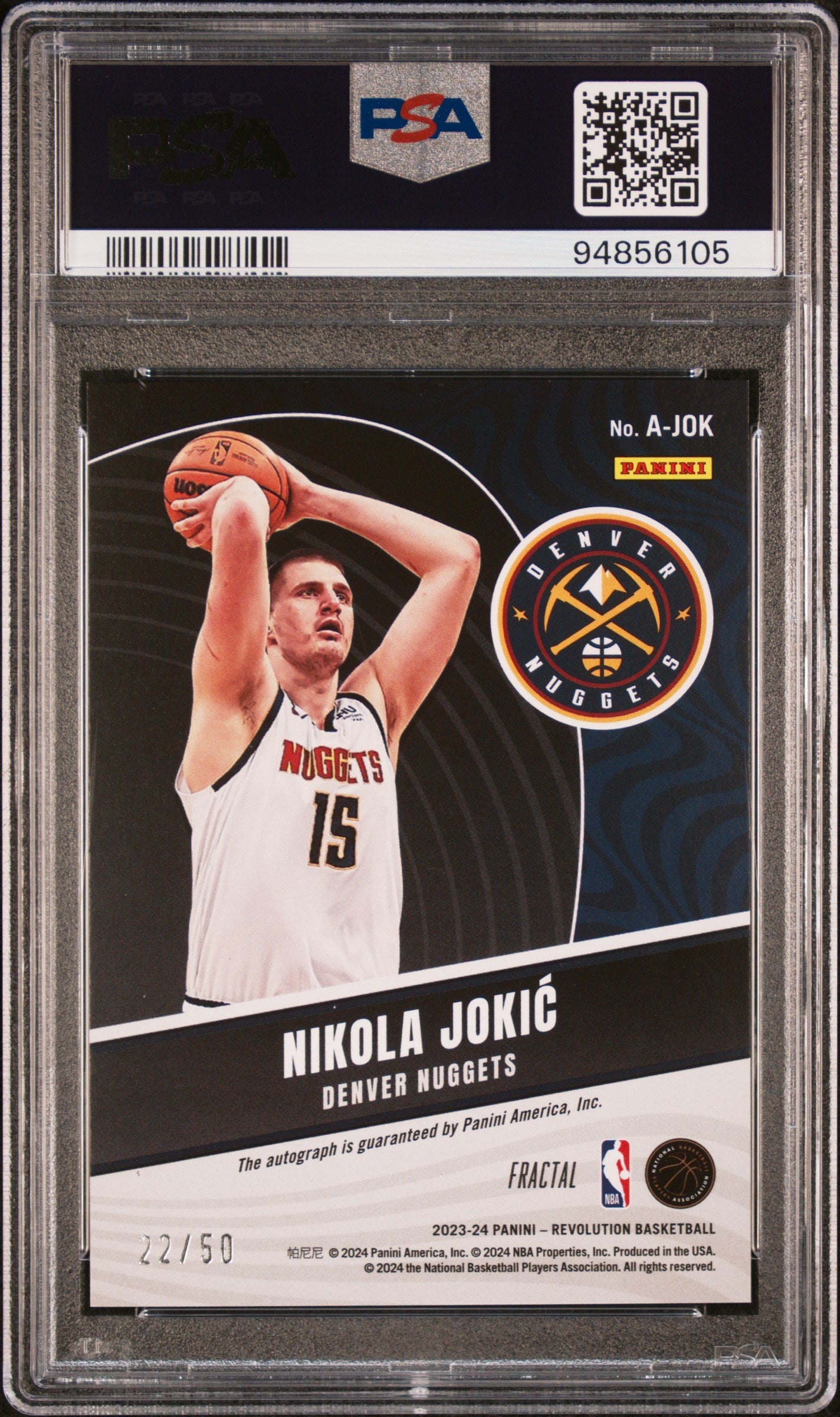 PSA-graded Nikola Jokic 2023 Panini Revolution Fractal shooting a basketball card