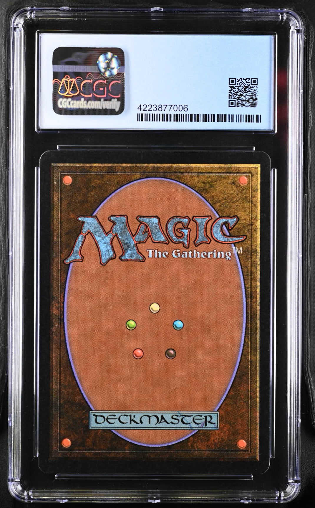 Graded Magic: The Gathering Unlimited Edition card back in protective case