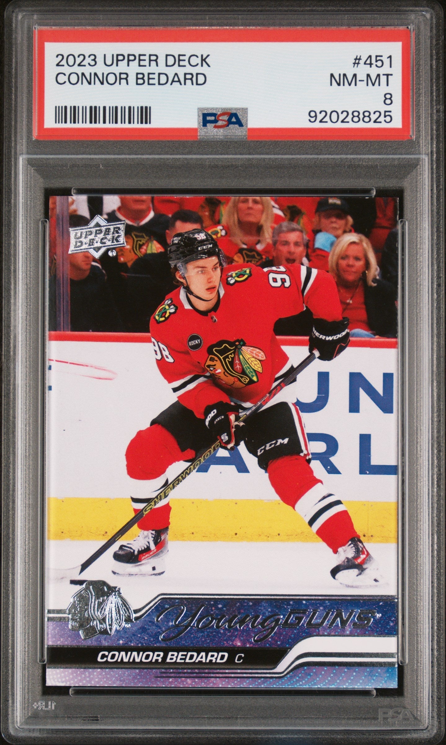 Connor Bedard 2023 Upper Deck trading card PSA 8 featuring Blackhawks player skating