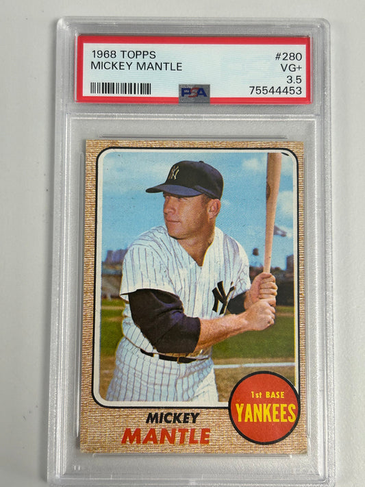 PSA-graded 1968 Topps Mickey Mantle baseball card in protective case, Very Good+ condition