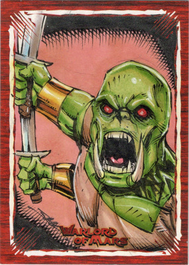 Angry green monster with red eyes and swords on Jim Kyle’s Warlord of Mars sketch card