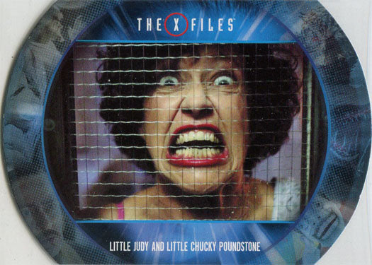 Circular trading card with distorted face behind grid, featuring The X Files design