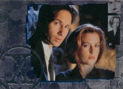 Portrait of a man and woman in formal wear for X-Files Connections trading cards