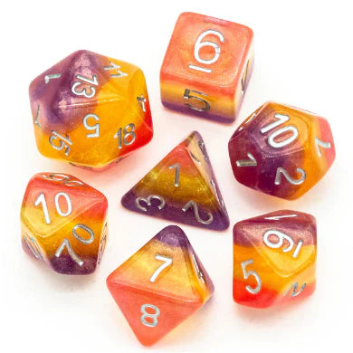 Wyldfire RPG Dice Set featuring translucent orange, yellow, and purple polyhedral dice