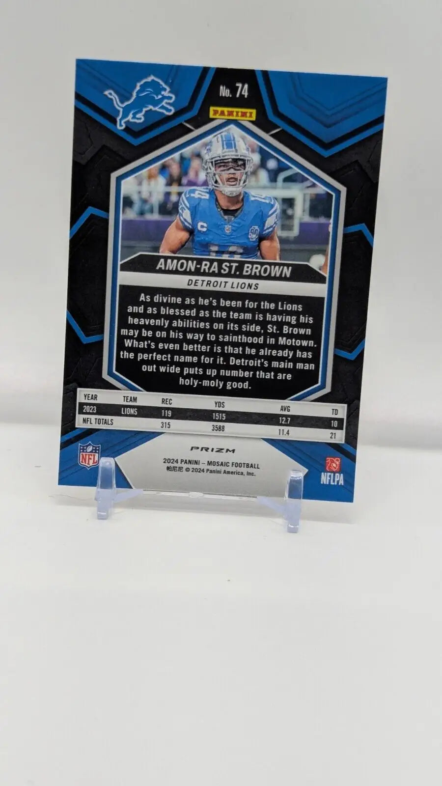 Amon-Ra St. Brown 2024 Panini Mosaic Reactive Yellow Prizm football card for Lions fans