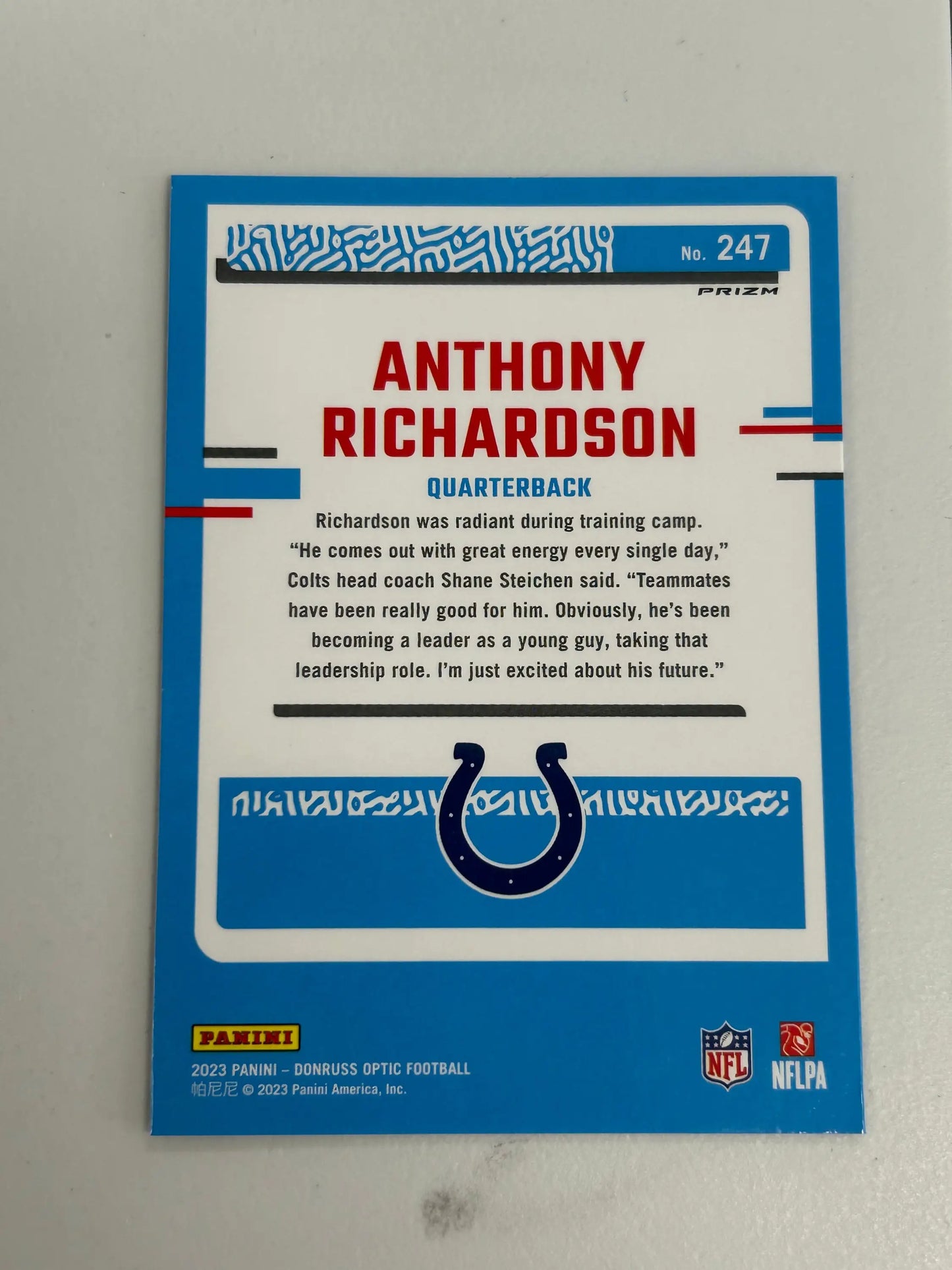 Back side of Anthony Richardson 2023 Panini Optic Purple Stars Holo NFL trading card