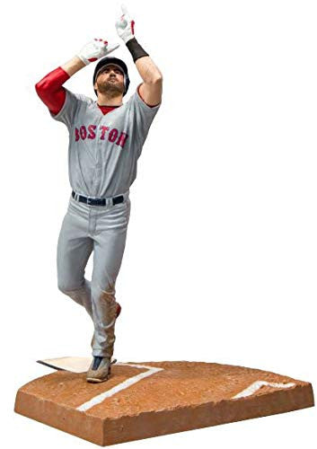 Boston Red Sox JD Martinez figurine celebrating in a vibrant red sox uniform