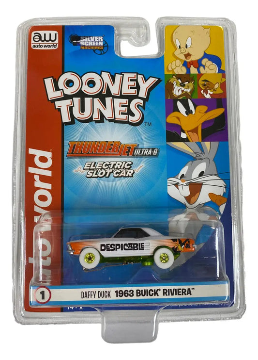 Packaged toy car with Looney Tunes characters, featuring Thunderjet SC363 R33 design