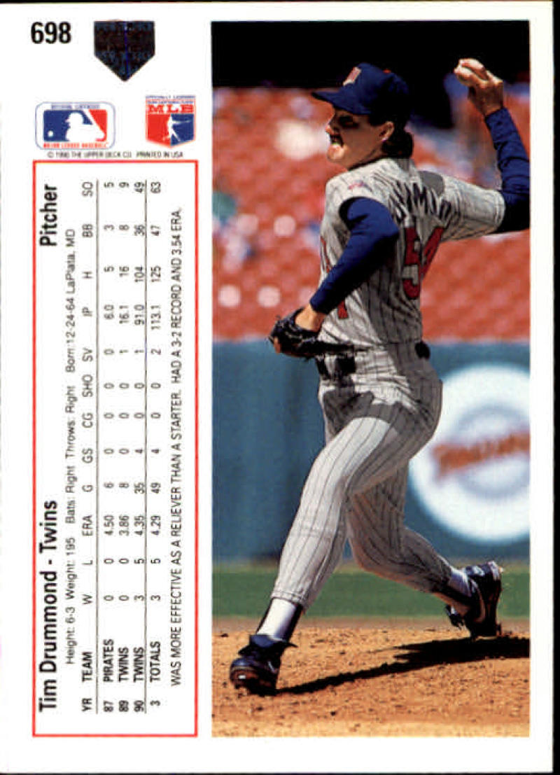 Tim Drummond delivering a pitch in New York Mets uniform, featured on a baseball card