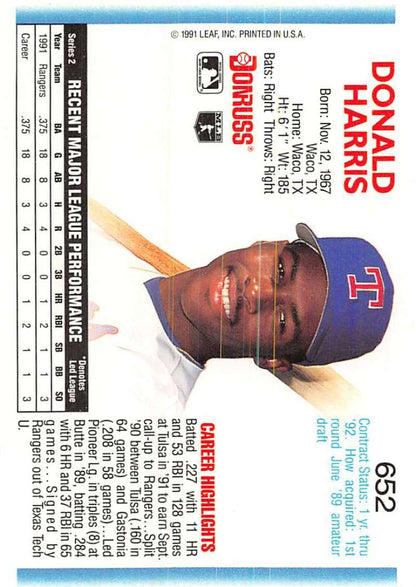 Baseball card of Donald Harris with Texas Rangers cap in blue, 1992 Donruss #652