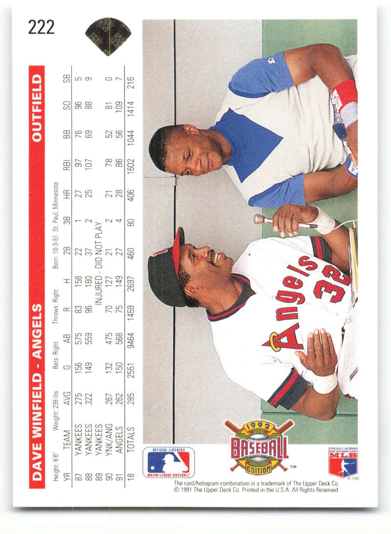 Baseball trading card of Dave Winfield with California Angels during a game interaction