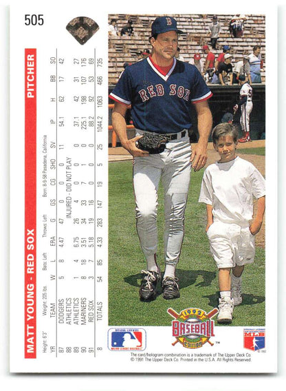 Boston Red Sox player Matt Young with young fan on baseball field in 1992 Upper Deck card