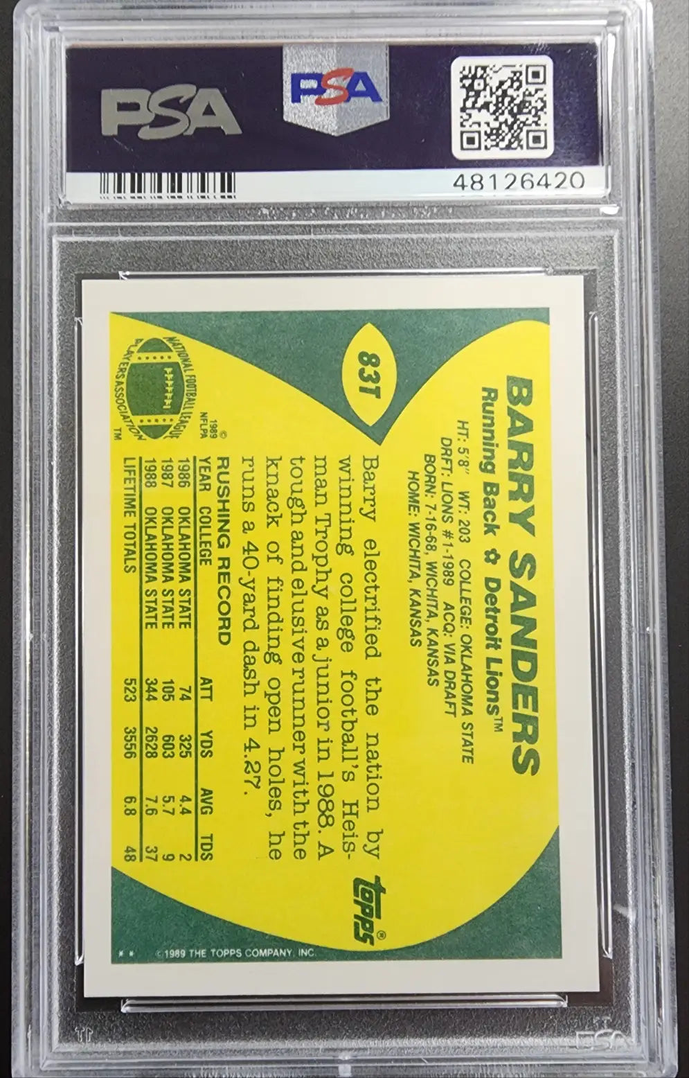 PSA-graded Barry Sanders 1989 Topps Traded Rookie #93T card reverse with yellow green colors