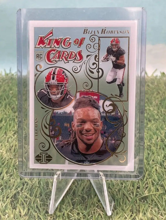 Football trading card featuring Bijan Robinson in ornate Panini Illusions design