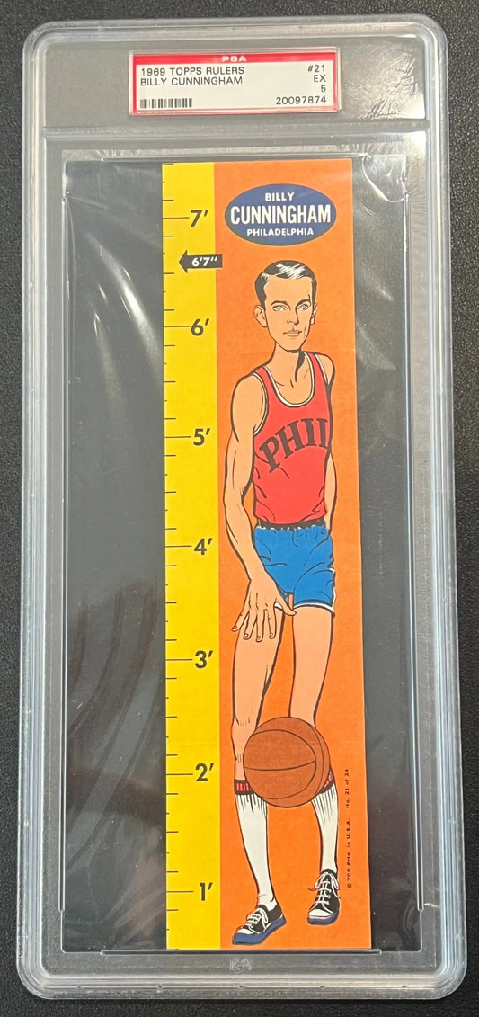 PSA-graded Billy Cunningham Topps Rulers vintage card on orange background