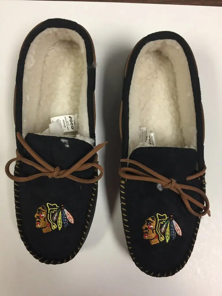 Black Chicago Blackhawks moccasin slippers with fur lining and team color, available in shoe sizes