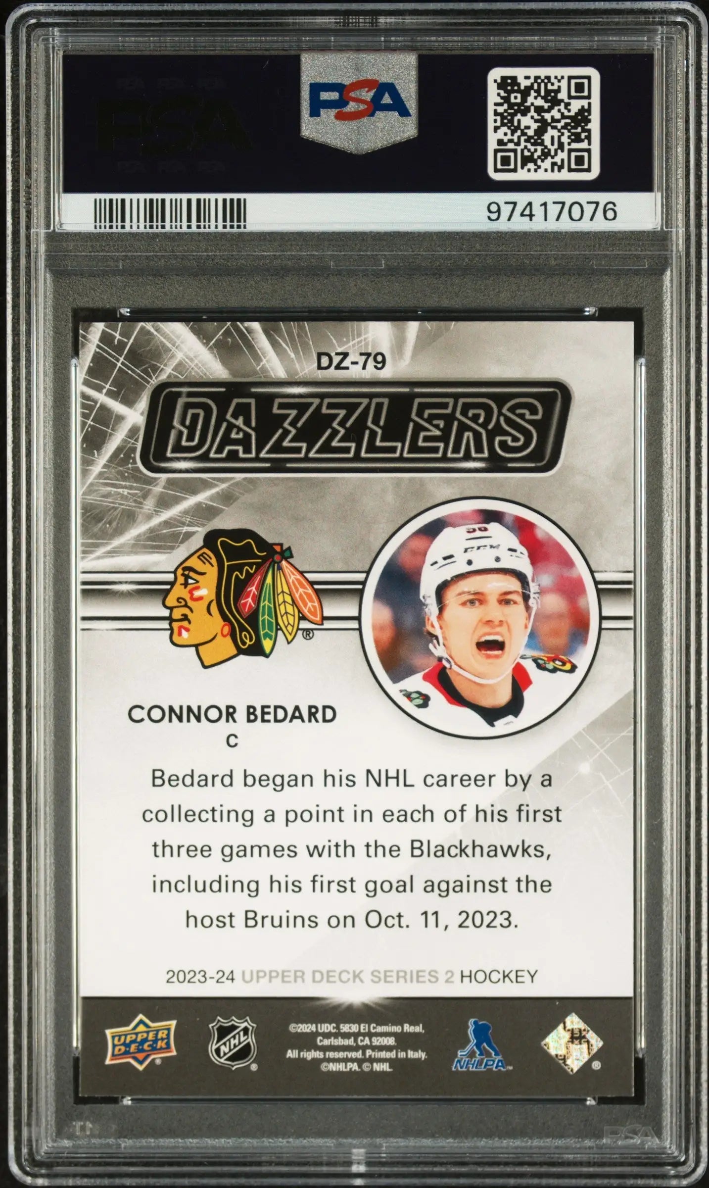 Hockey trading card of Connor Bedard in Upper Deck Dazzlers Red PSA 10 protective case