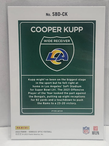 Cooper Kupp 2023 Donruss Optic Super Bowl Downtown card with Rams logo and green background