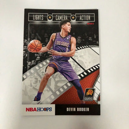 Devin Booker 2019–20 Hoops #25 Camera Action Insert Phoenix Suns NBA card