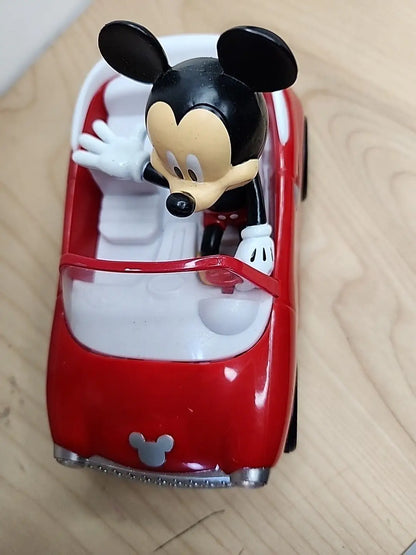 Mickey Mouse driving a red car from Mickey Mouse Clubhouse Roadster RC Car