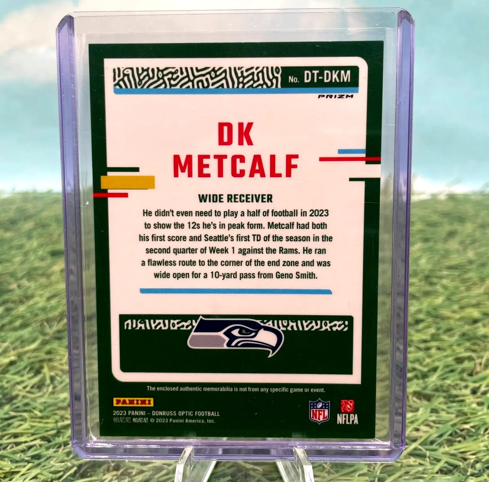 DK Metcalf football card from 2023 Panini Donruss Optic Threads in Blue Hyper design