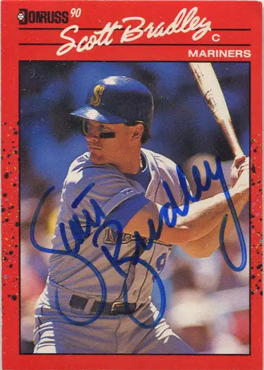 Autographed base card of Scott Bradley in Mariners uniform at bat from Donruss 1990