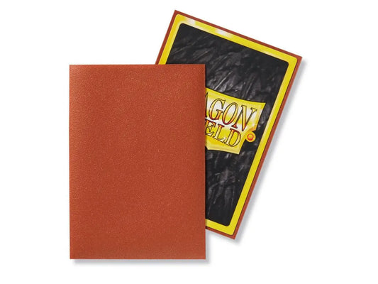 Orange Dragon Shield Matte Sleeve Copper Munay positioned over a game card protector for trading cards