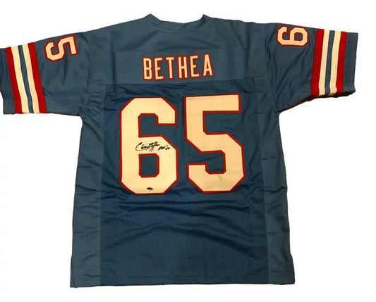 Autographed Houston Oilers jersey with number 65 and name Bethea on the back