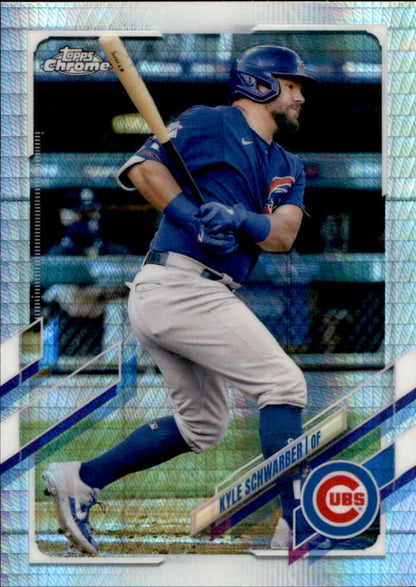 Chicago Cubs player Kyle Schwarber batting in blue uniform on Refractor Prism card