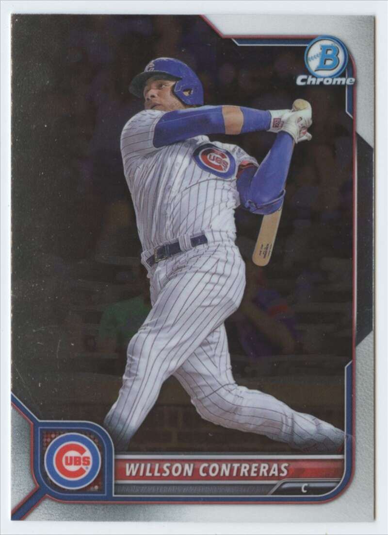 Willson Contreras swings in a Chicago Cubs pinstriped uniform baseball card