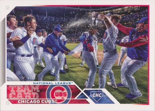 Chicago Cubs players celebrate with beverages on the field in 2023 Topps NM-MT Team Card