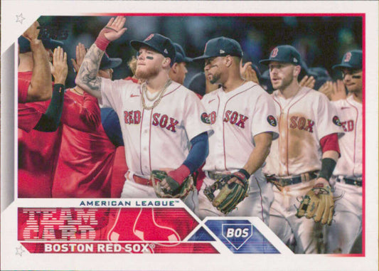 Boston Red Sox players celebrate in home white uniforms on 2023 Topps #273 card