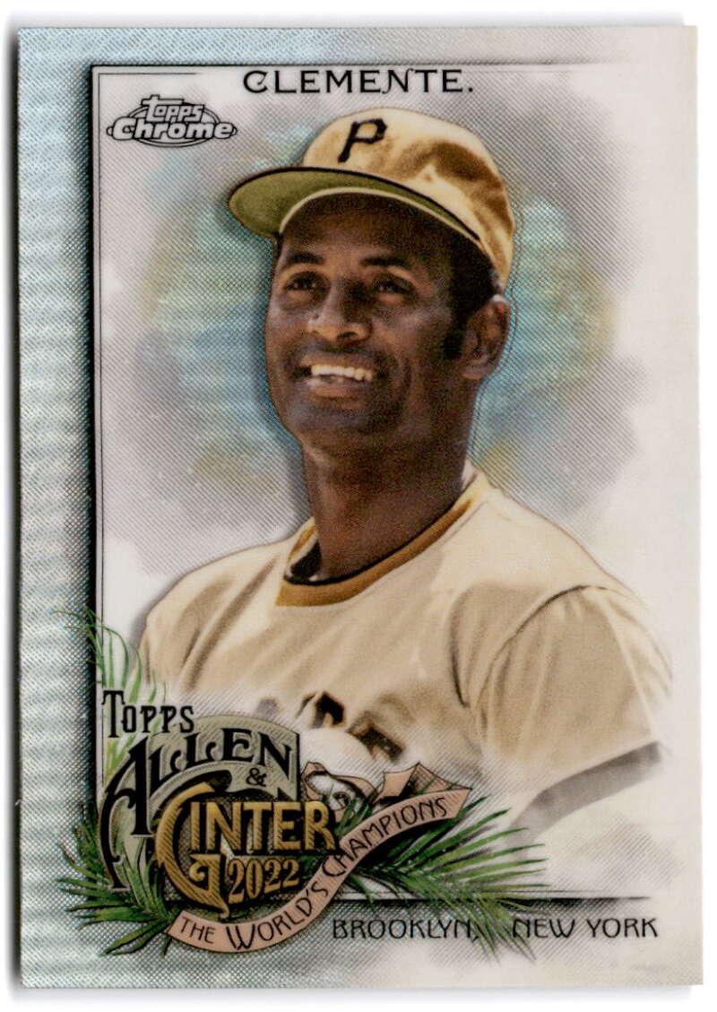 A Pittsburgh Pirates Baseball Card of Roberto Clemente in a gold cap and cream uniform