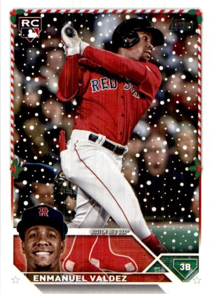 Red Sox rookie Enmanuel Valdez swinging bat on 2023 Topps Holiday baseball card