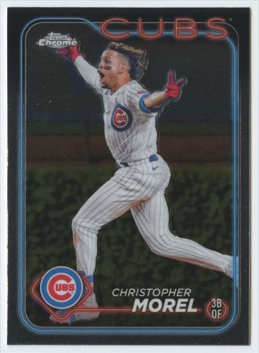 Christopher Morel celebrating in a white pinstriped uniform on a Topps Chrome baseball card