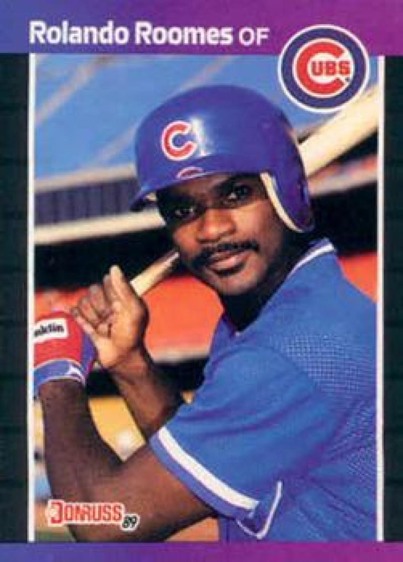 Chicago Cubs Rolando Roomes baseball card with player making peace sign gesture