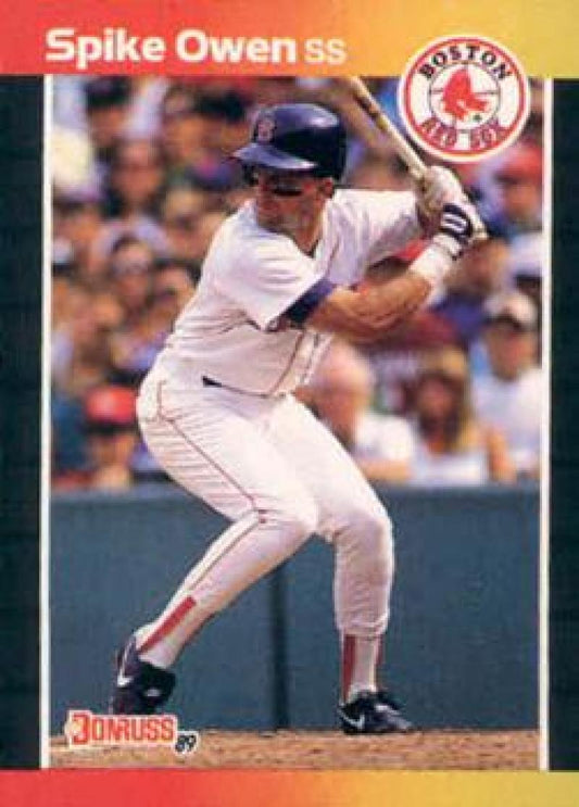 Baseball player in Boston Red Sox uniform at bat, Spike Owen on 1989 Donruss card