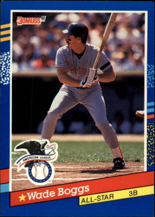 1991 Donruss Wade Boggs baseball card featuring Red Sox player at bat