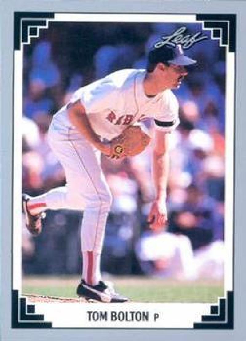 Baseball card of Boston Red Sox pitcher Tom Bolton in delivery motion wearing white uniform