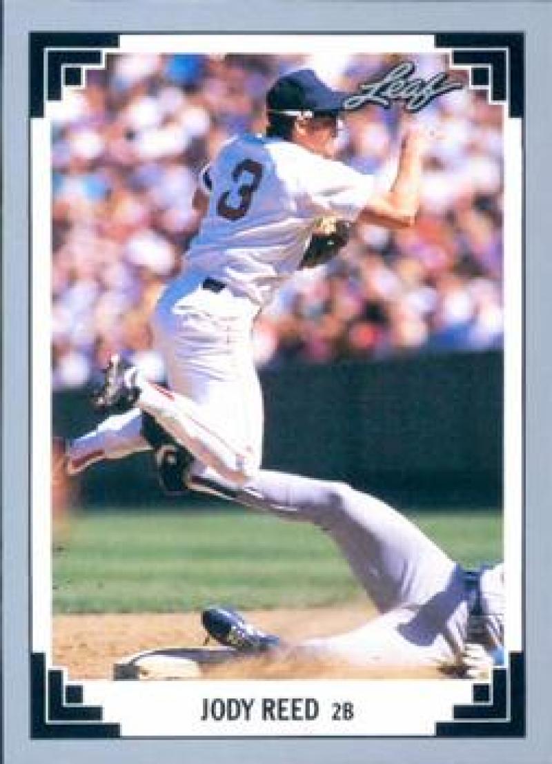 Baseball player in white uniform swinging bat for Boston Red Sox 1991 Leaf card