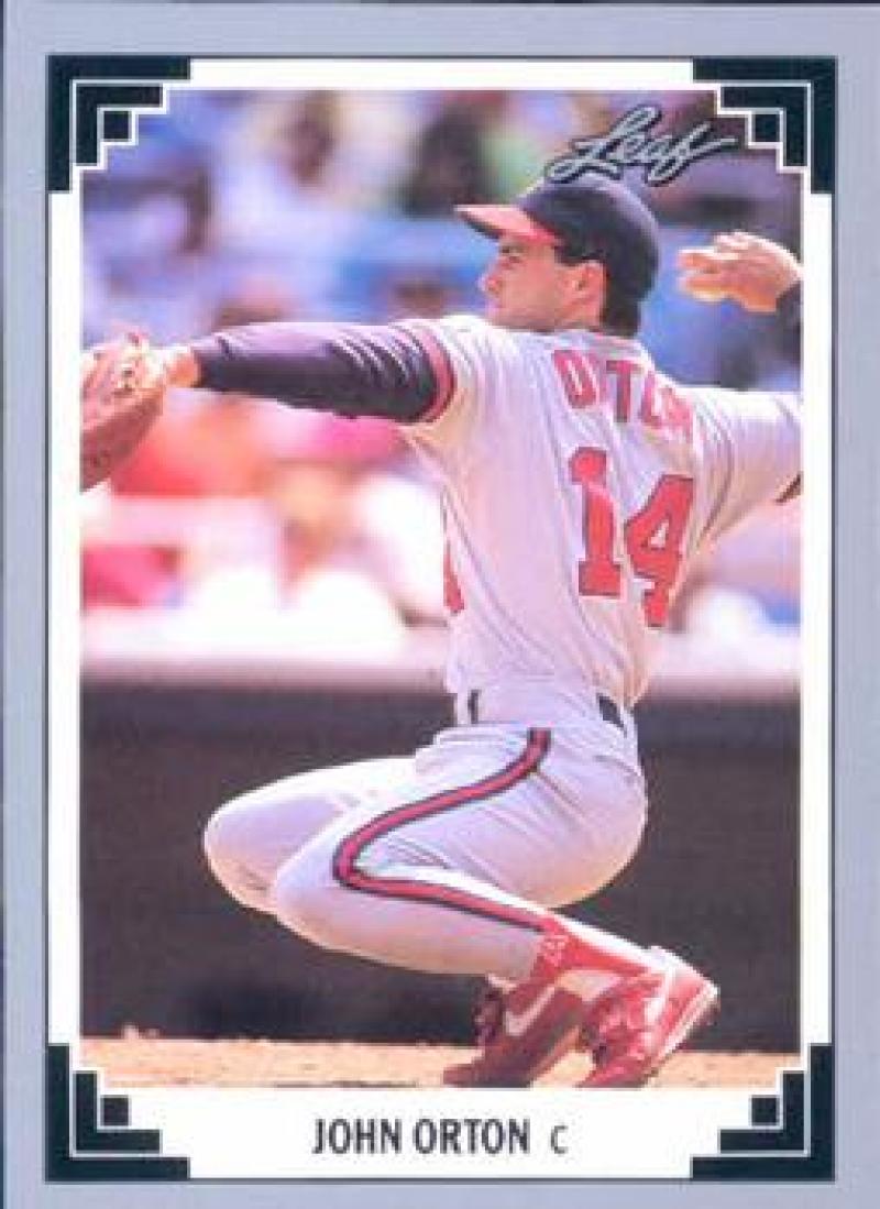 Baseball player in white uniform pitching, featured on John Orton California Angels baseball card