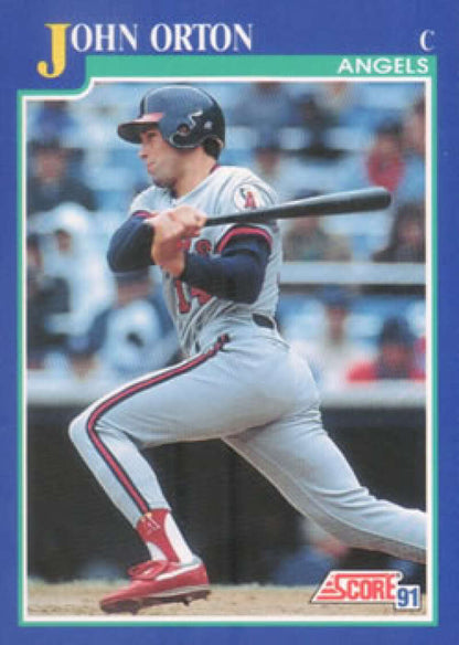 Baseball card of John Orton in white uniform for California Angels at bat