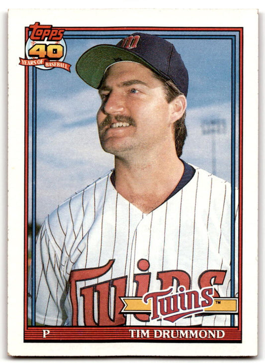 Baseball card of Tim Drummond in a Minnesota Twins pinstriped uniform