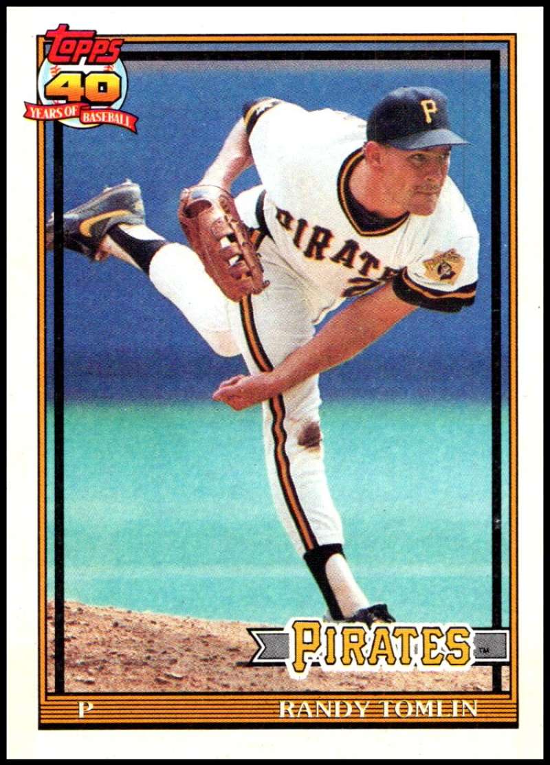 Pittsburgh Pirates baseball card of Randy Tomlin mid-delivery in white home uniform