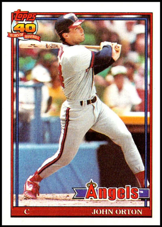 Baseball card of John Orton mid-swing in California Angels uniform